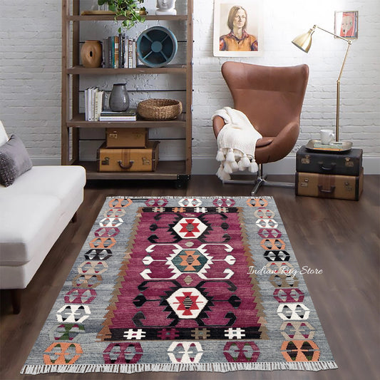 Alfombra de yute y lana tejida a mano con motivos geométricos multicolores en marrón óxido Alfombra de yute y lana tejida a mano con motivos geométricos multicolores en marrón óxido