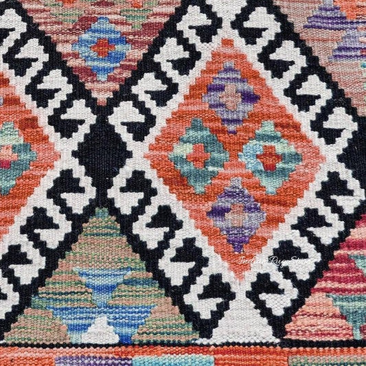 Alfombra de yute y lana tejida a mano con motivos geométricos en color negro y multicolor para la sala de estar Alfombra de yute y lana tejida a mano con motivos geométricos en color negro y multicolor para la sala de estar