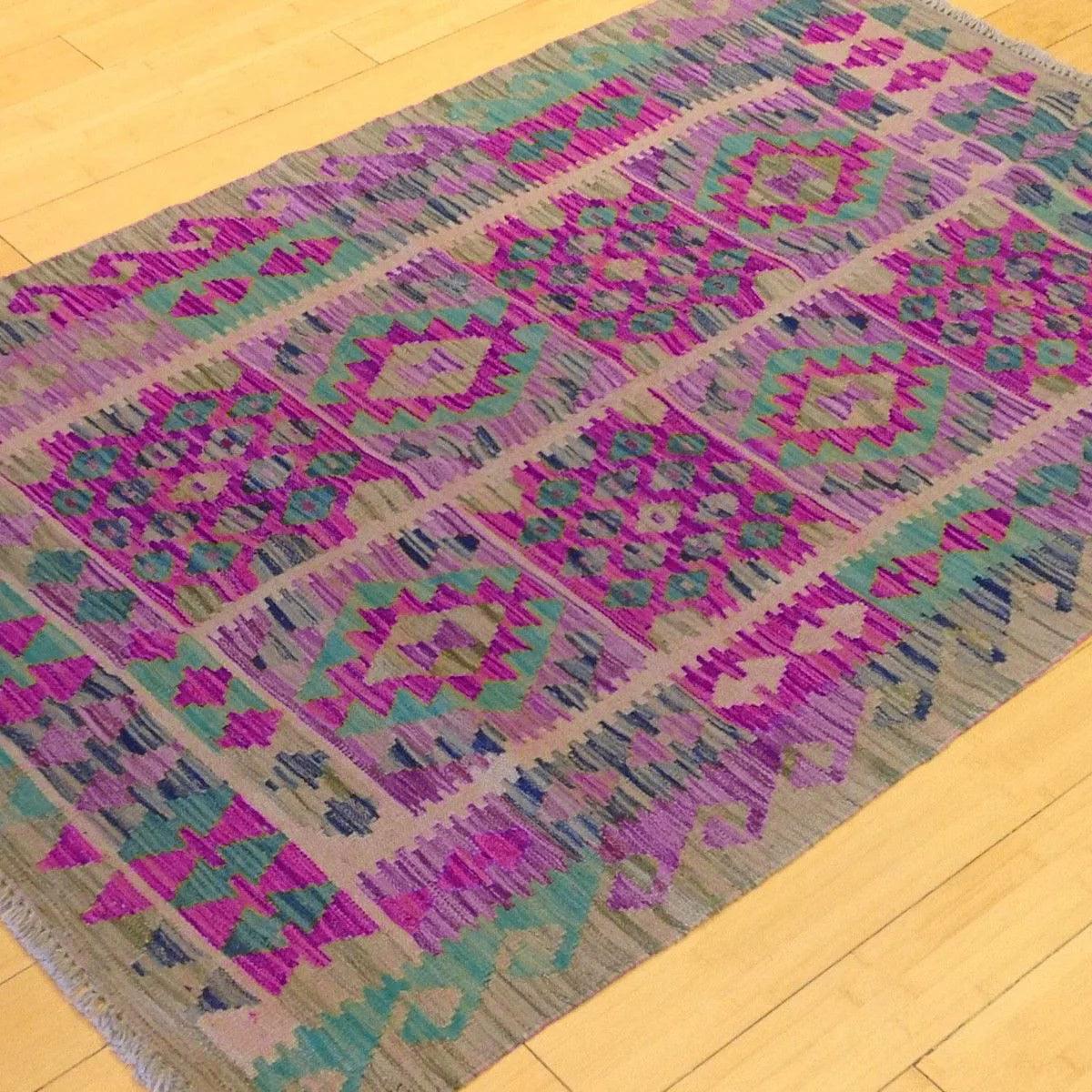 Alfombra Kilim para exteriores de lana rosa tejida a mano WK-568