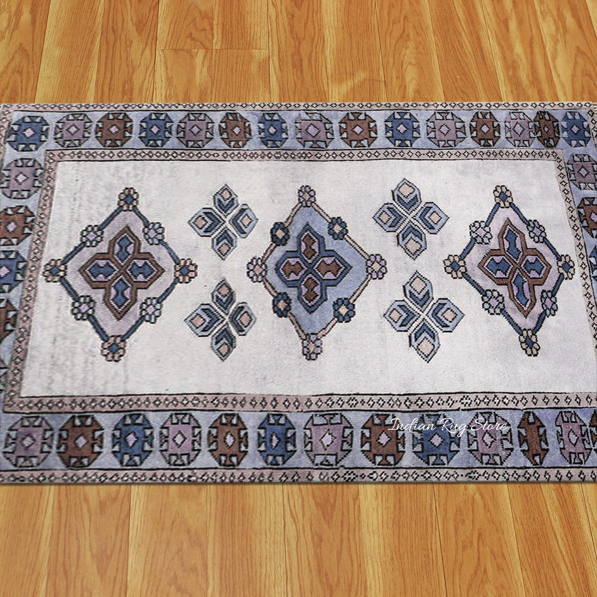 Natural Blue and Gray Bordered White Wool Area Rug