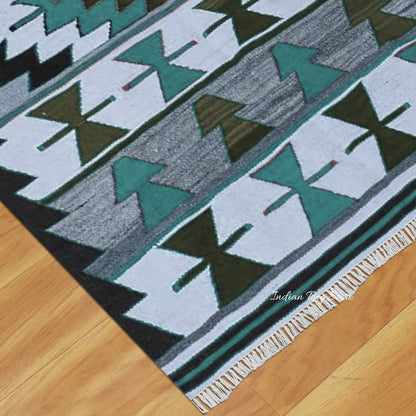 Alfombra de yute y lana tejida a mano con motivos geométricos en color negro y multicolor para la sala de estar