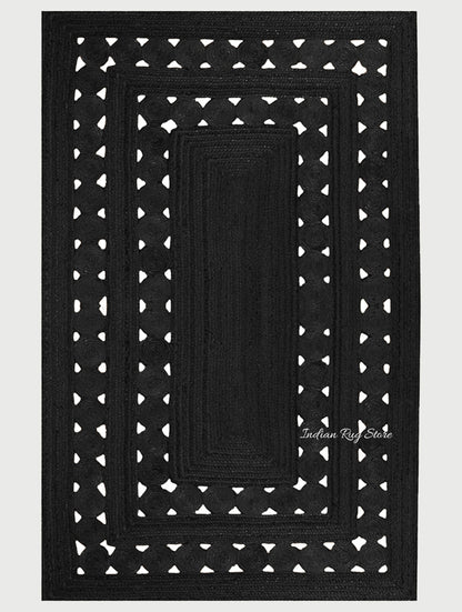 Alfombra de yute trenzada a mano con forma rectangular y decoración rústica en color negro