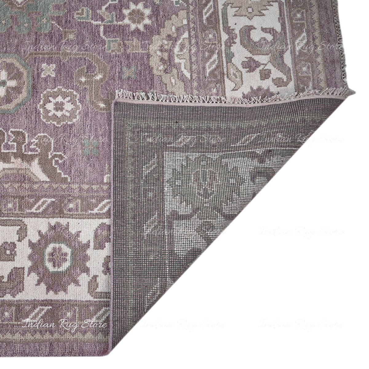 Detailed close-up of an Oushak rug.