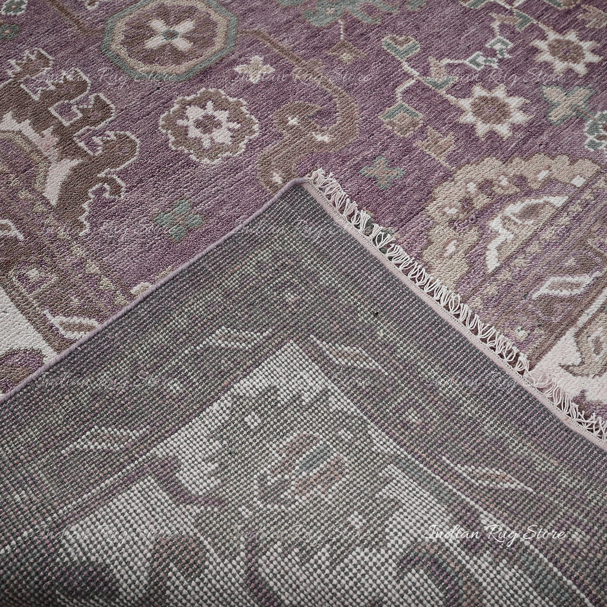 A close-up of an Oushak rug