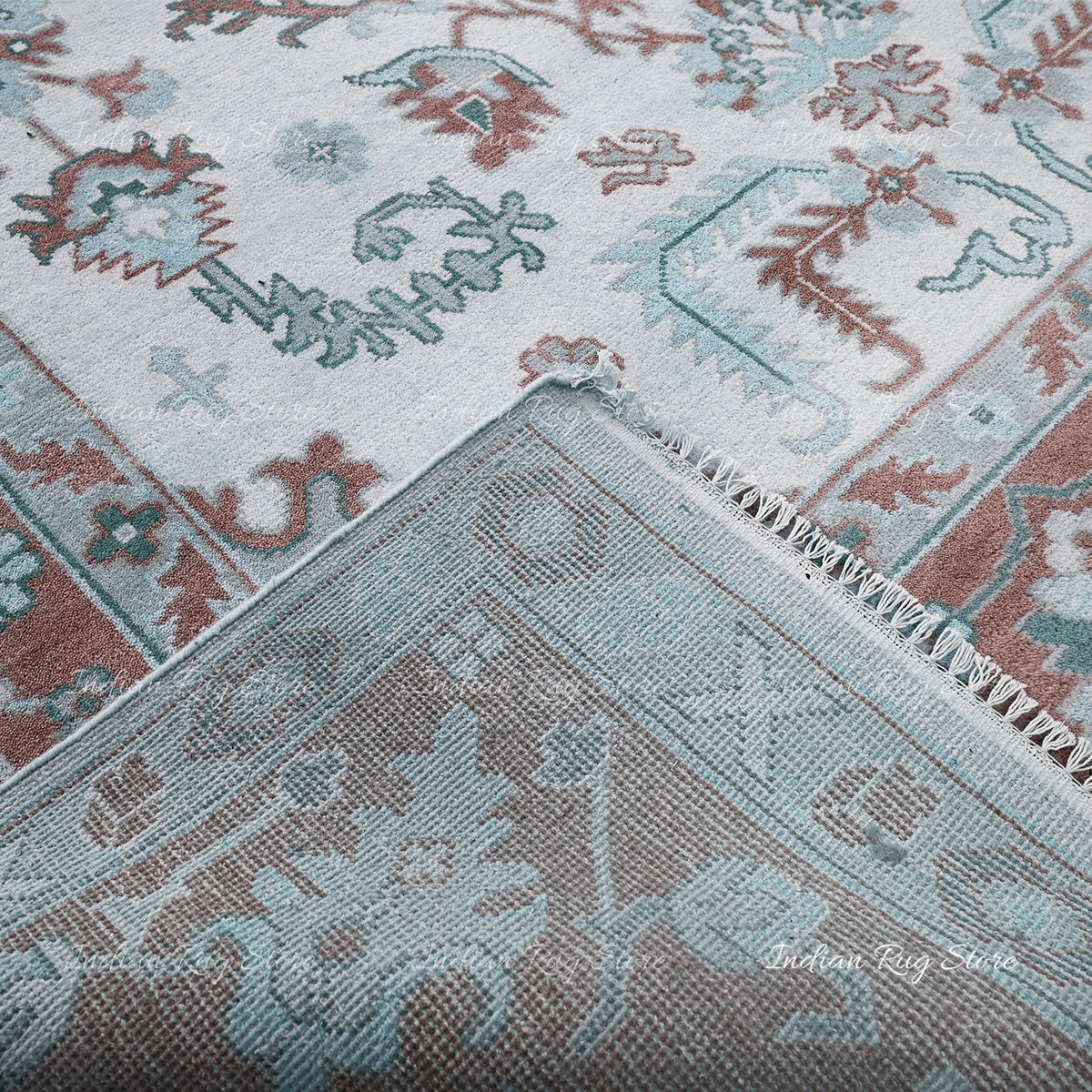 Soft combine beautifully in the detailed close-up of this Oushak rug.