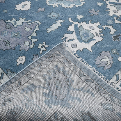 The fine texture of this Oushak rug features soft tones