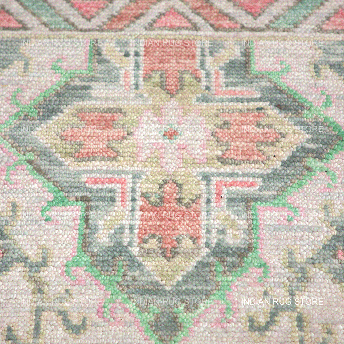 A detailed close-up of an Oushak rug